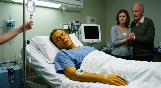A jaundiced patient in a hospital bed receiving emergency treatment illustrating the severe liver failure symptoms of mushroom poisoning from Death Cap Amanita phalloides ingestion